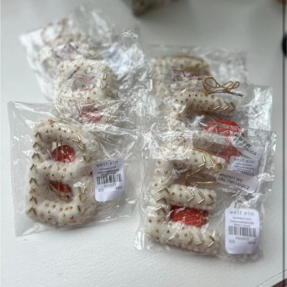 ONE * West Elm Handcrafted Wool Cream Holiday Ornament Message for which Letter